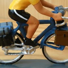 CBG Mignot Model Cyclist Touring on Blue Bike with Yellow Jersey